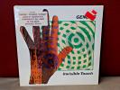 Genesis - Invisible Touch  7 81641-1-E  TEXTURED 