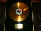 FOREIGNER 4 GOLD DISC PRESENTED TO ROBERT 
