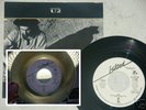 U2 brown vinyl USA 7