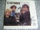 U2 FULLY SIGNED LP OCTOBER + COA
