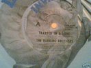 Barrino Brothers / Trapped in a Love / Invictus