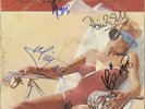 ROLLING STONE BAND SIGNED ALBUM WITH C.O.A VERY RARE