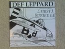 L K DEF LEPPARD  FIRST STRIKE EP IN RED VINYL