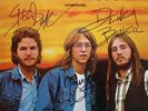 AMERICA  *AUTOGRAPHED  Homecoming  ALBUM BY All THREE*