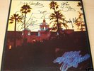 THE EAGLES group autographed signed ALBUM / LP w/COA