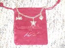 Mariah Carey charmbracelet, 3 charms, and velvet bag