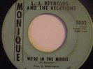 L.J. REYNOLDS & RELATIONS We're In The Middle HEAR IT
