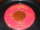 johnny horton - i'm coming home / i got a hole in my p.