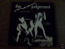 THE NEON JUDGEMENT - COCKERILL SOMBRE. WITH INSERT