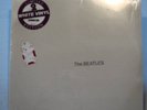 The Beatles (white album)  LP on white vinyl w/ sticker