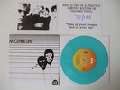 U2 ANOTHER DAY LTD NUMBERED TURQUOISE VINYL 7
