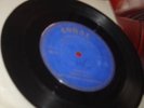 BUDDY HOLLY  HEARTBEAT 1 SIDED DEMO 7 INCH CORAL VINYL