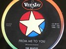 45 RPM record Beatles VJ 522 oval logo from me to you