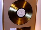 Metallica and Justice goldene Schallplatte gold record