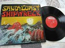 SANDY COAST - SHIPWRECK      PAGE ONE - RECORDS