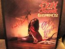 BILZZARD OF OZZ - SIGNED / AUTO OZZY AND RANDY RHOADS