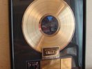 Disque d'or + K7 d'or certifié RIAA de