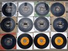 Twelve Elvis Presley 45 RPM Records