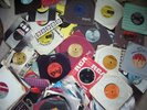 records, old 45's and retro stereo player.