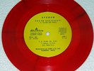 JULIO IGLESIAS A FLOR DE PÌEL BOLIVIA 7' RED VINYL