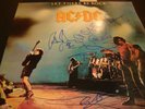 AC/DC Let There Be Rock, Autographed/signed. Mint condition with Angus portrait