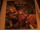 TRAPEZE MEDUSA BLACKLIGHT GLOW VINYL AND SIGNED