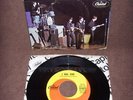 The Beatles. She’s A Woman/I Feel Fine. 45rpm Record with Picture Sleeve.