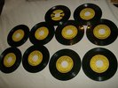 9 early Sun Records and 1 Carl Perkins record on Columbia label, all 45 RPMs