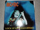 AC / DC  LOCK UP YOUR DAUGHTERS 