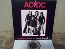 AC/DC Rare LP- A GIANT DOSE OF ROCK  AND ROLL  VERY RARE