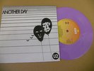 u2....another day....purple vinyl..... repress..........