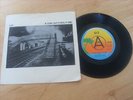 U2 - A DAY WITHOUT ME 7 INCH A LABEL PROMO
