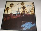 THE EAGLES - HOTEL CALIFORNIA - LP SLEEVE (SIGNED)