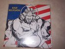 BAD RELIGION - AMERICAN JESUS - 7 INCH SIGNED BY MR. BRETT ART BY COOP.
