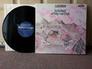 caravan in the land of grey and pink