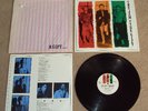 THE JAM, A GIFT. RARE VINYL LP WITH STRIPED PAPER BAG.POLD 5055. [ PAUL WELLER ]