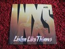 INXS - Listen Like Thieves LP Sleeve Signed by Michael Hutchence