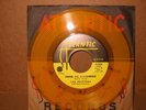 THE DRIFTERS       UNDER THE BOARDWALK     7'  45   STOCK  YELLOW VINYL MINT