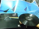 Pink Floyd dark side of the moon LP record with poster