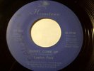 RARE -LAXTON FORD - HURRY COME UP  KILLER ROOTS REGGAE on the HOMETOWN LABEL 45