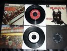 Collection of 24 Beatles Singles/EPs  in a vintage record box