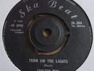 CARLTON REID   TURN ON THE LIGHTS ** 1966 SKA BEAT 45  MINT UNPLAYED.