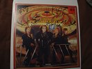 the damned-anything lp.totally unique signed and doodled by band