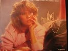 Autographed Agnetha single Wrap your arms around me.