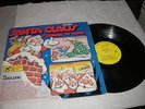 The Caroleers Santa Claus Is Coming To Town LP Howie Post Cover NM- Vinyl Tested