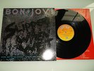 BON JOVI-SLIPPERY WHEN WET...1ST ISSUE NEAR MINT/EXCELLENT VINYL LP 1986