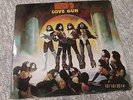 KISS Love Gun First Pressing Vinyl LP record with Toy Gun, inserts 1977