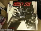 MOTLEY CRUE TOO FAST FOR LOVE VINYL-AUTOGRAPHED BY THE WHOLE BAND
