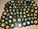 More Than Seventy (70)  Beatles Vinyl 45s w/Metal Record Case