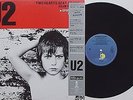U2 - Two Hearts Beat As One 12